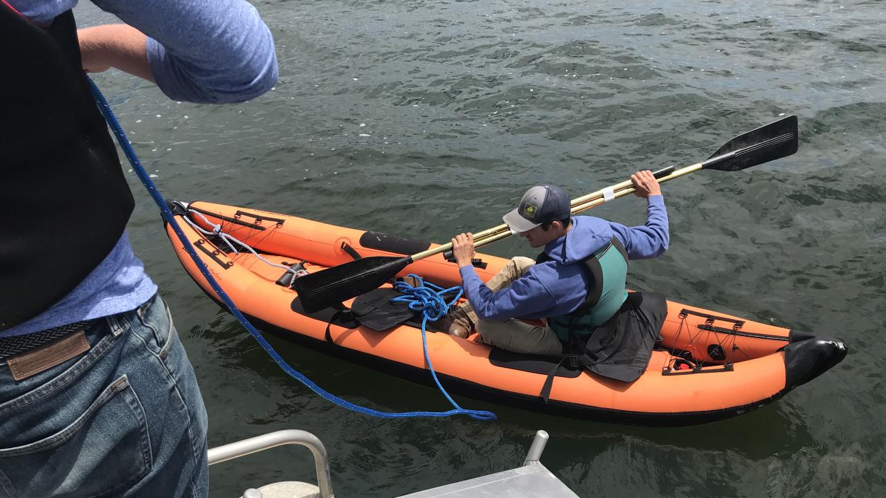 Seining for mooring ball with inflatable kayak